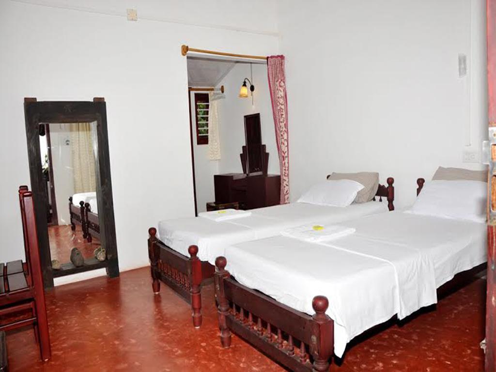 Angeo Beach House Alappuzha Værelse billede