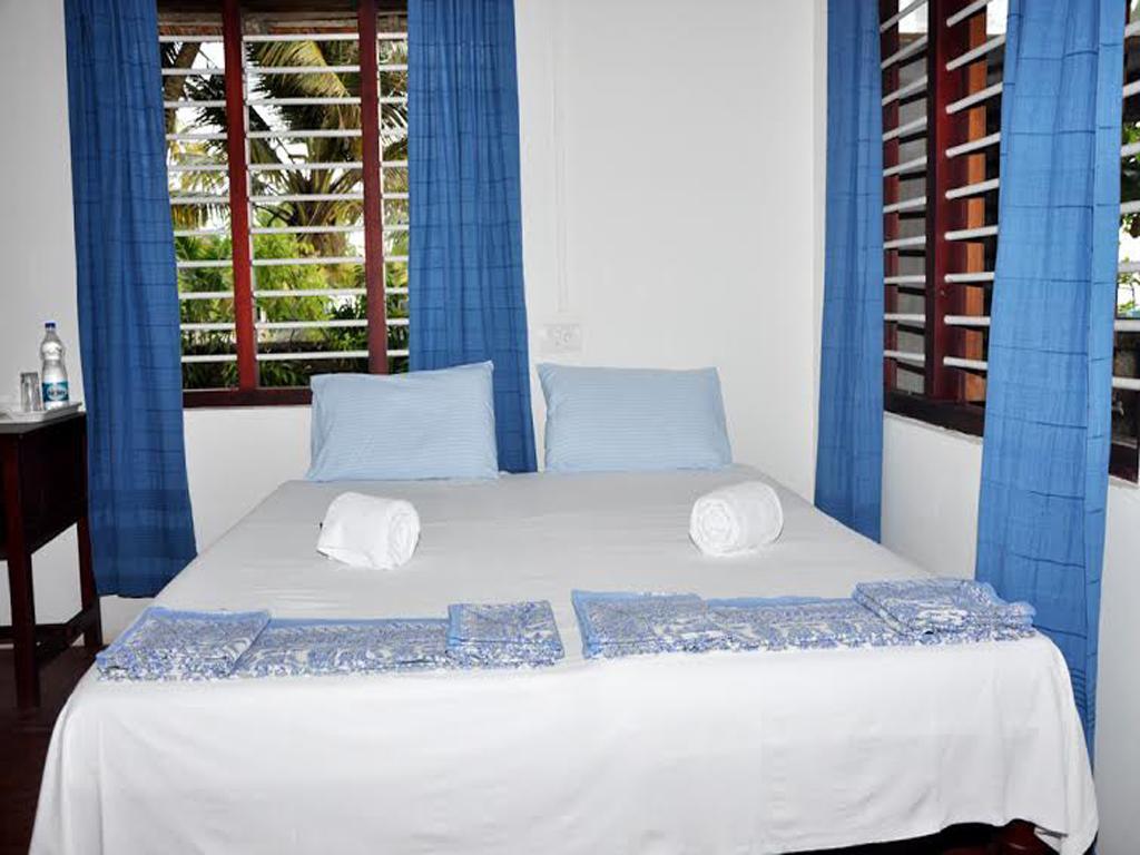 Angeo Beach House Alappuzha Værelse billede